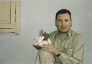 Gerhard Wagner poses with a Pakistan tourmaline fine mineral specimen
