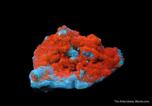 Shortwave ultraviolet results in remarkable color changes in this smithsonite on willemite from Namibia. 