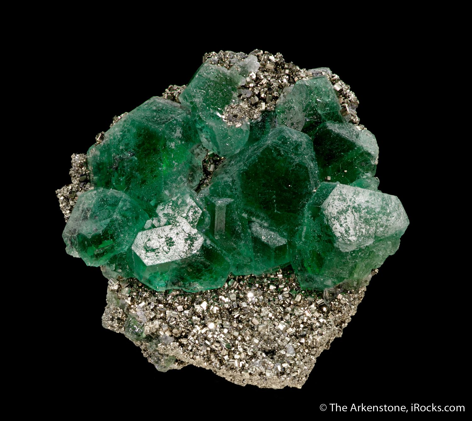 Bold green fluorite on pyrite. Small cabinet specimen from Cerro de Pasco, Peru.